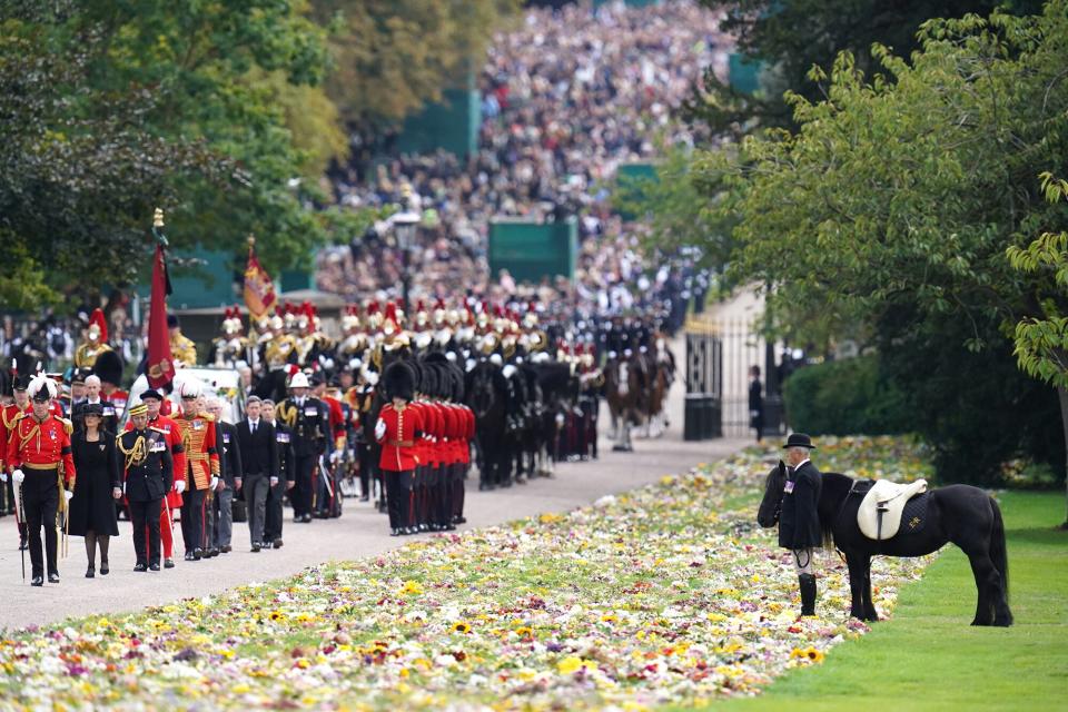 Emma, the monarch's fell pony, stands as the Ceremonial Procession of the coffin of Queen Elizabeth II