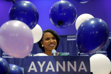Balloons fall around Democratic candidate for U.S House of Representatives Ayanna Pressley at her primary election night rally in Boston, Massachusetts, U.S., September 4, 2018. REUTERS/Brian Snyder