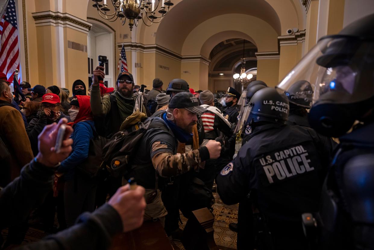 Supporters of then President Donald Trump protest inside the US Capitol on January 6, 2021, in Washington, DC.