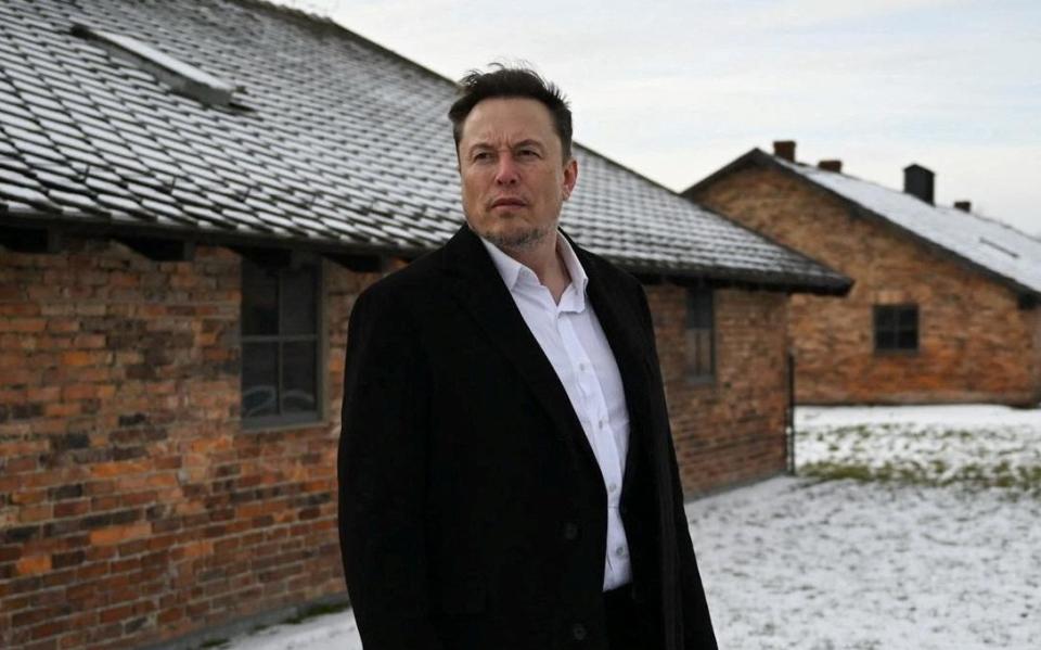 elon musk at auschwitz