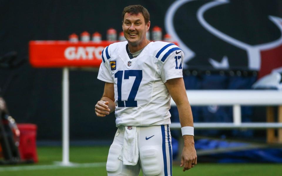 Indianapolis Colts quarterback Philip Rivers (17) smiles before the game against the Houston Texans at NRG Stadium.  - Troy Taormina-USA TODAY Sports