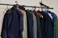 The studio is always ready with an assortment of blazers if the client forgets to bring a suit for formal photographs.