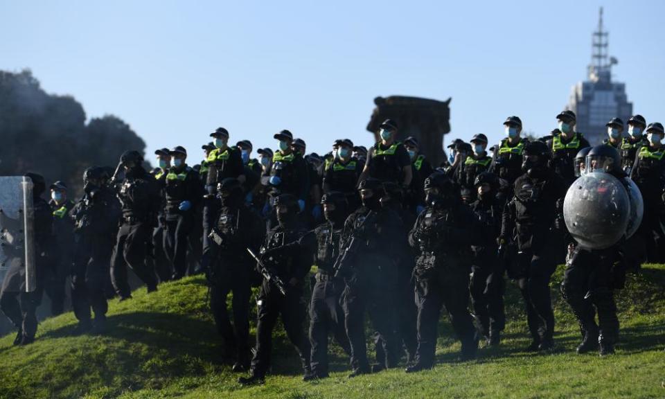 Riot police move protesters on at the Shrine of Remembrance on Wednesday.