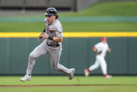 Arizona Diamondbacks' Jake McCarthy advances to third base on a single hit by Tucker Barnhart during the third inning of a baseball game against the Cincinnati Reds Tuesday, May 7, 2024, in Cincinnati. (AP Photo/Jeff Dean)