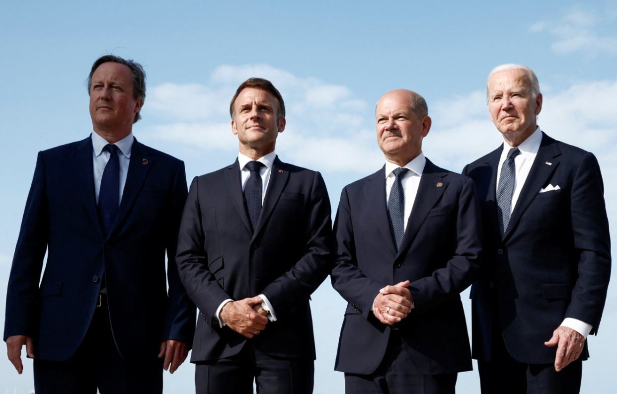 Britain's Foreign Secretary David Cameron, French President Emmanuel Macron, German Chancellor Olaf Scholz and U.S. President Joe Biden attend the international ceremony marking the 80th anniversary of the 1944 D-Day landings and the liberation of western Europe from Nazi Germany occupation