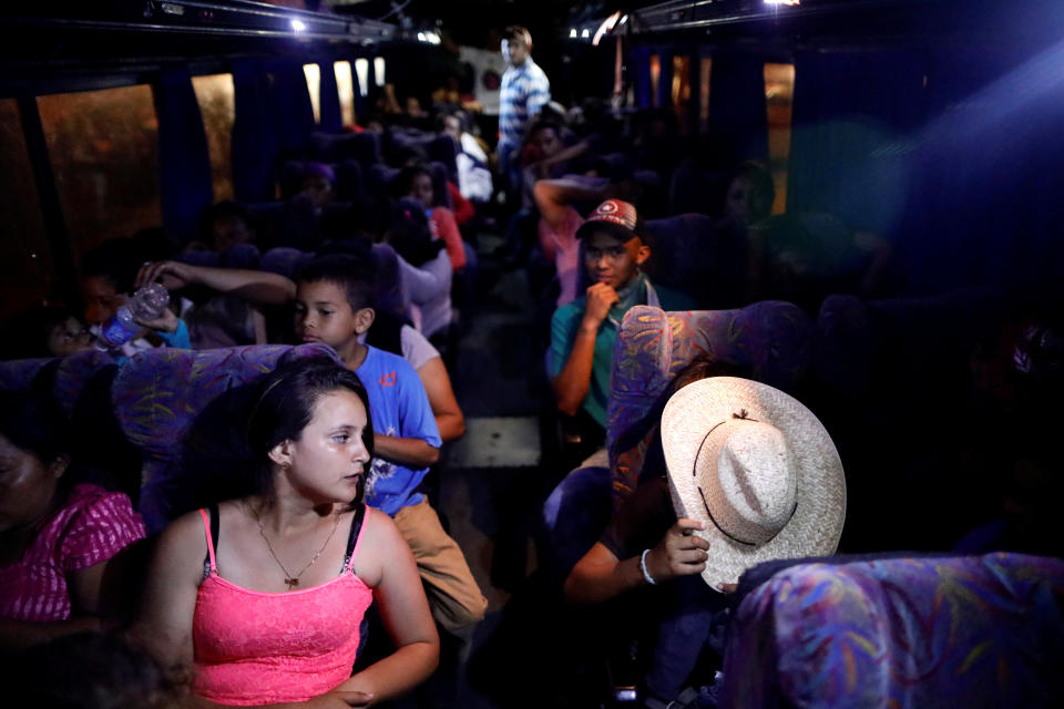 <p>Central American migrants, part of a caravan moving through Mexico toward the U.S. border, sit on a bus bound for Puebla, in Matias Romero, Mexico April 5, 2018. (Photo: Henry Romero/Reuters) </p>