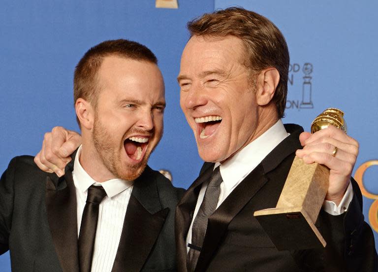 Aaron Paul and Bryan Cranston (R), pose after Cranston won Best Actor in a TV drama and "Breaking Bad" won Best Series - Drama, at the Golden Globes, January 12, 2014