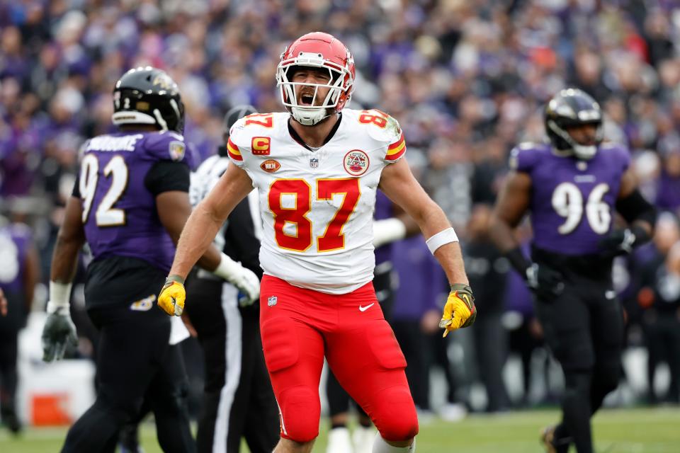 Kansas City Chiefs tight end Travis Kelce (87) celebrates after scoring a touchdown against the Baltimore Ravens during the first half in the AFC Championship football game at M&T Bank Stadium.