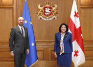 In this photo provided by the Georgian Presidential Press Office, Georgia's President Salome Zurabishvili attends a meeting with European Council President Charles Michel in Tbilisi, Georgia, Monday, March 1, 2021 (Georgian Presidential Press Office via AP)