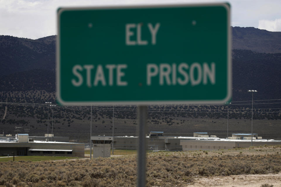 FILE - A sign marks the entrance to Ely State Prison, the location of Nevada's execution chamber near Ely, Nev., July 11, 2018. (AP Photo/John Locher, File)