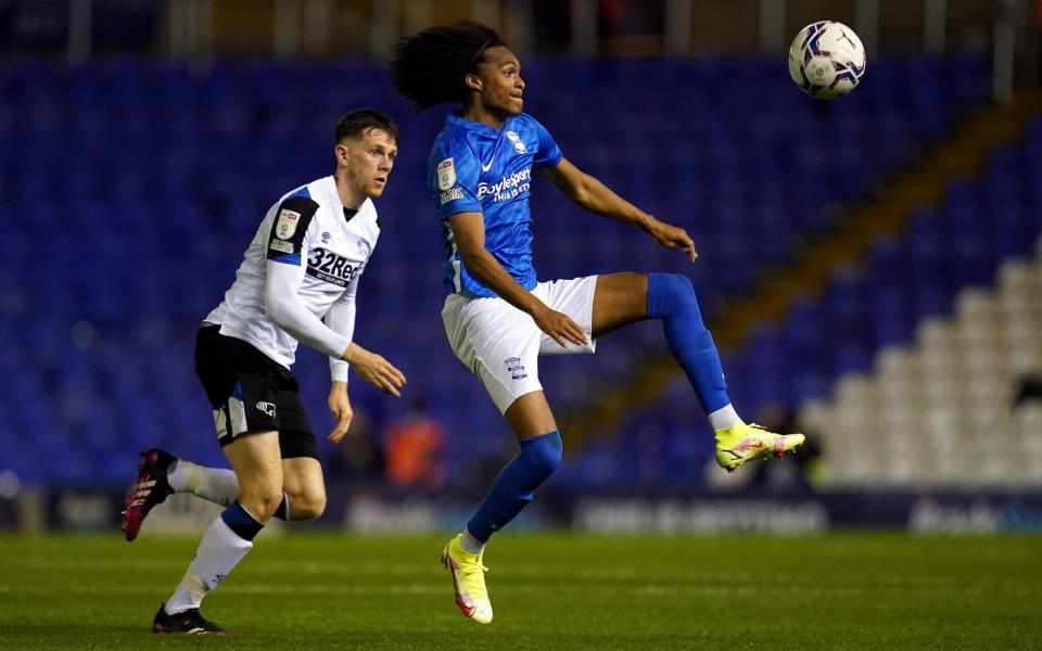 Tahith Chong goes for the ball in a Championship match - PA