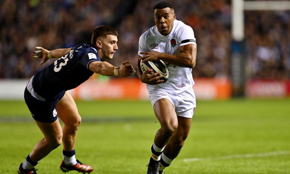 <span>Immanuel Feyi-Waboso breaks past Cameron Redpath to score at Murrayfield.</span><span>Photograph: Dan Mullan/RFU/The RFU Collection/Getty Images</span>