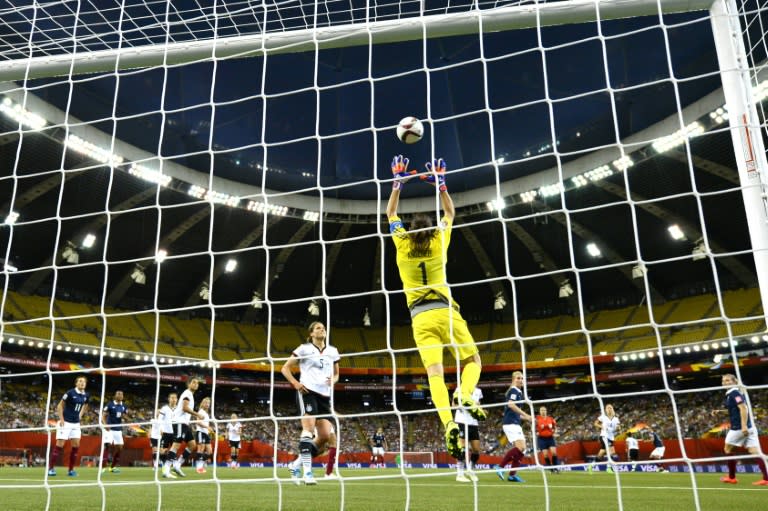 Goalkeeper Nadine Angerer of Germany jumps for the ball during their FIFA Women's World Cup quarter-final match against France, at Olympic Stadium in Montreal, Canada, on June 26, 2015