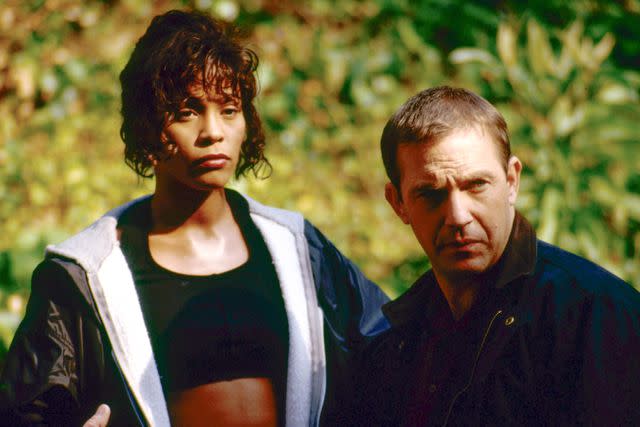 <p>THA/Shutterstock</p> Whitney Houston and Kevin Costner in "The Bodyguard"