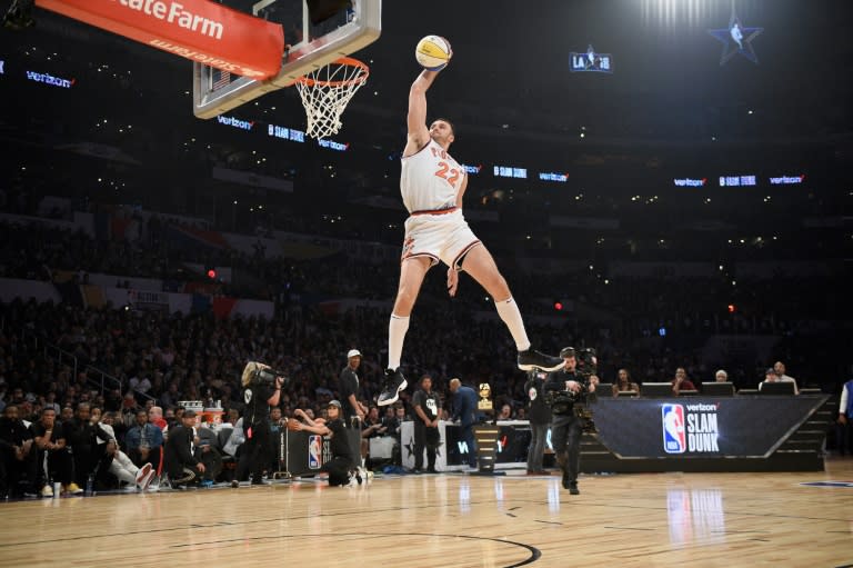Larry Nance Jr. of the Cleveland Cavaliers, wearing his dad's jersey, competes in the 2018 Verizon Slam Dunk Contest