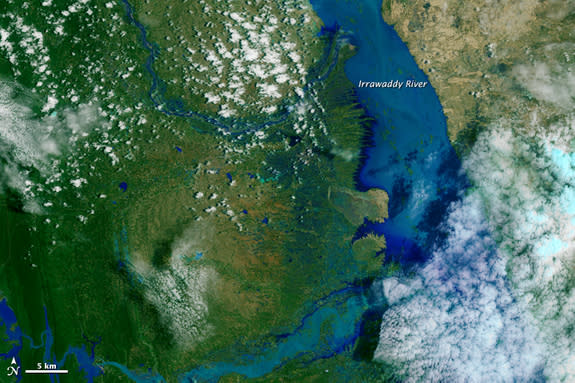 The Irrawaddy River flooding in a false-color satellite image taken Aug. 3, 2015. NASA Earth Observatory image using Landsat data from the U.S. Geological Survey.