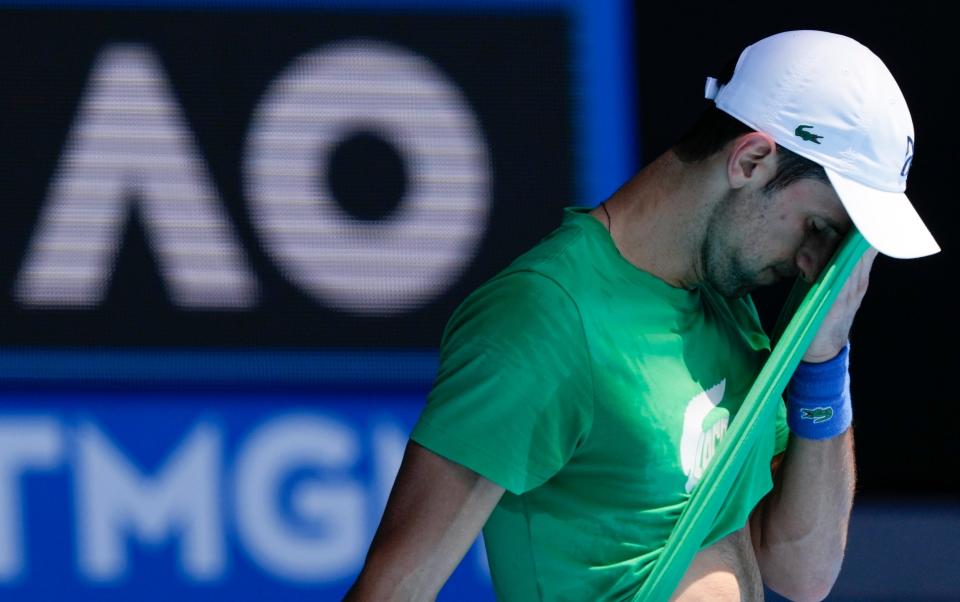 Defending men's champion Serbia's Novak Djokovic practices on Margaret Court Arena - AP