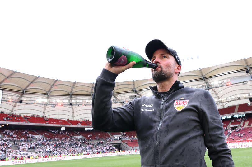 Sebastian Hoeness, Head Coach of VfB Stuttgart, acknowledges the fans