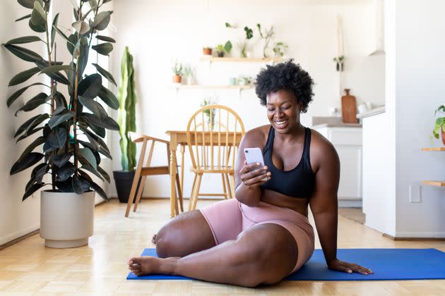 These inclusive workout apps and videos are designed to help people find more joy in movement. (Photo: Luis Alvarez via Getty Images)