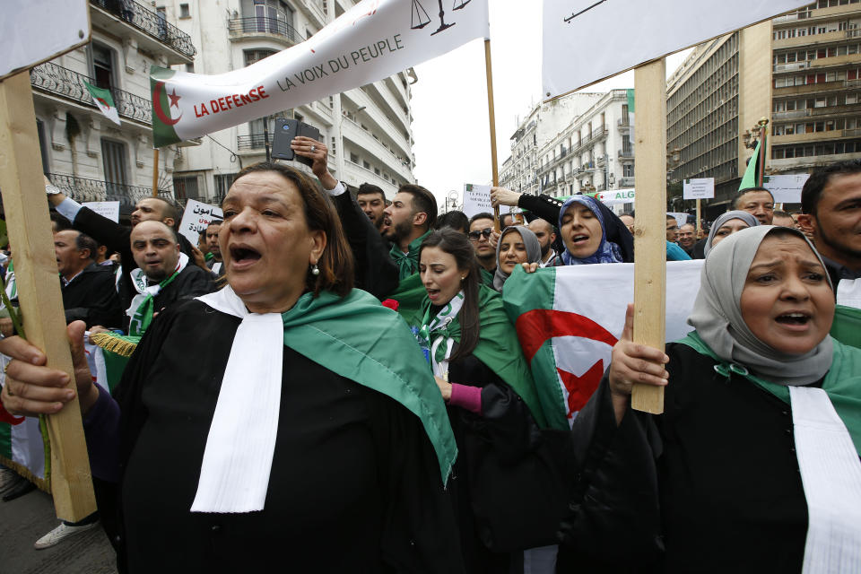 Algerian lawyers march to demand the departure of ailing 82-year-old Algerian President Abdelaziz Bouteflika at the end of his term scheduled on April 28, in Algiers, Saturday, March 23, 2019. The march comes a day after thousands of people demonstrated for the fifth straight Friday since nationwide anti-Bouteflika protests began on Feb. 22.(AP Photo/Anis Belghoul)