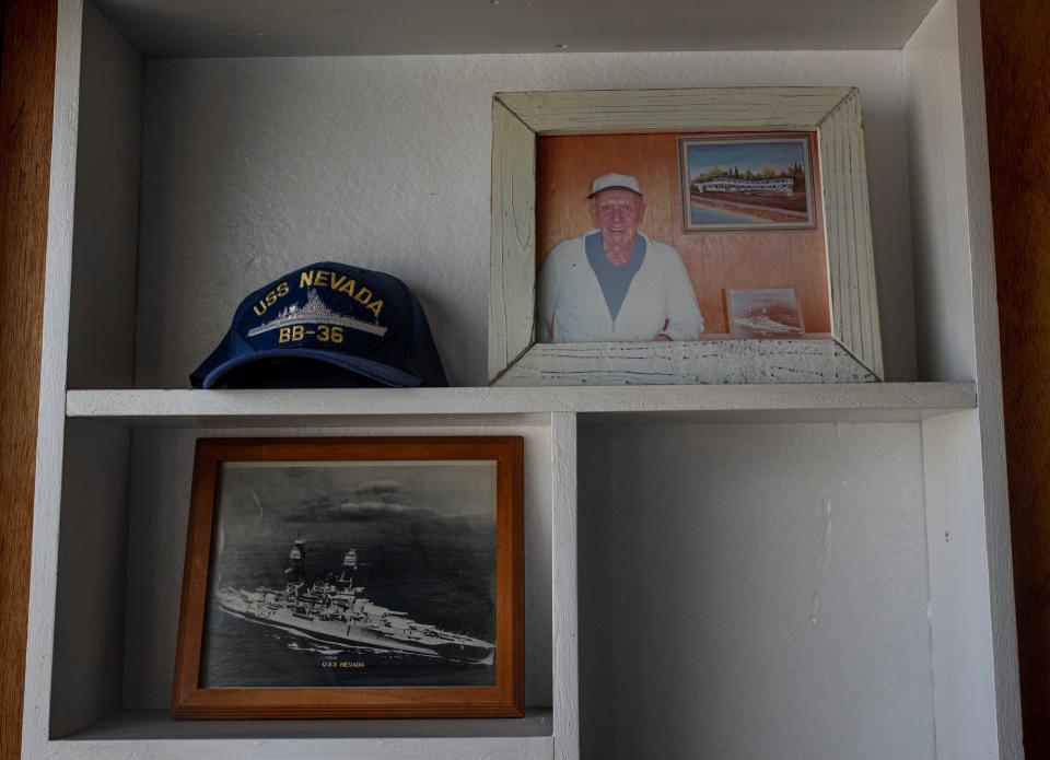 A photo of Henry de la Pena, the original owner of the Nevada Motel, is displayed in the motel office on July 28, 2021. De la Pena died in 2015 at 96 and left the hotel to his three children, Paul, Edward and Jeanette Prues, who are now selling the property for $2.75 million.