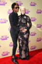 Dynamic duo Wiz Khalifa and Amber Rose took the opportunity to announce their pregnancy at the VMAs. Is that tacky? More importantly, what do you think of her embroidered, floor-length gown and Wiz’s cropped trousers? We’re not feeling either getup, but we’re happy for the expectant parents.