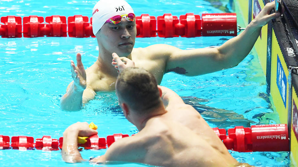 Sun Yang shakes hands with Kyle Chalmers after their 200m semi-final. (Photo by Quinn Rooney/Getty Images)