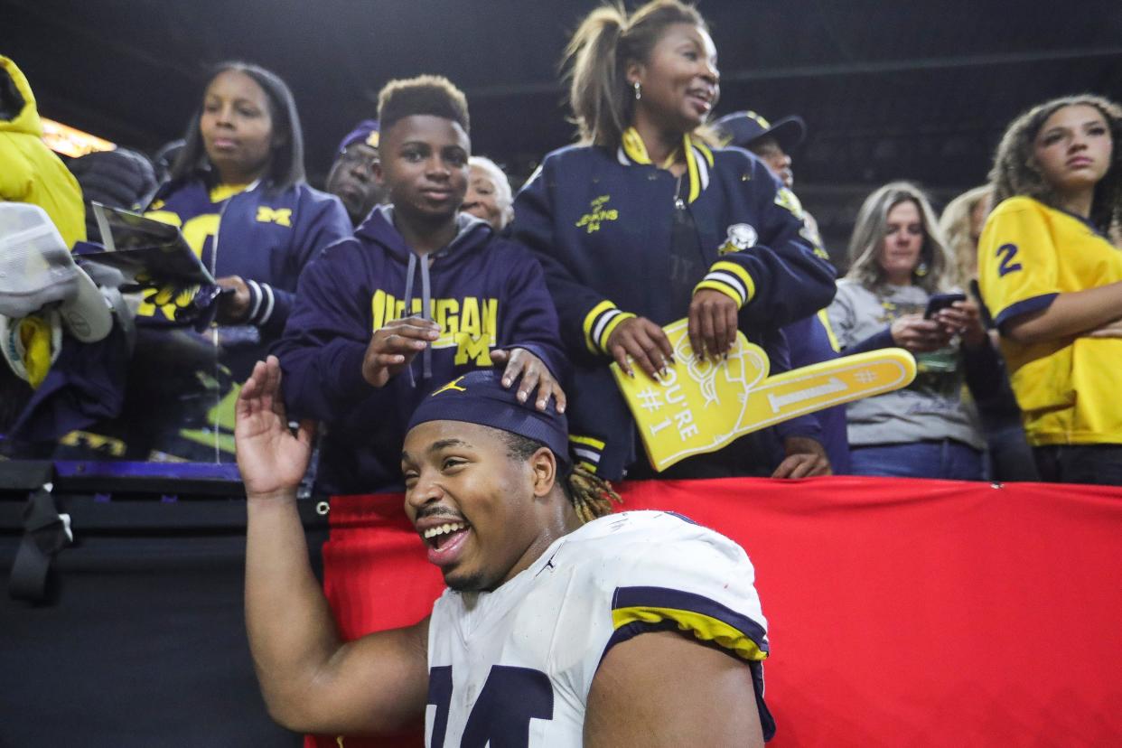 Michigan defensive lineman Kris Jenkins celebrates U-M's 26-0 win over Iowa in the Big Ten championship game in Indianapolis on Saturday, Dec. 2, 2023.