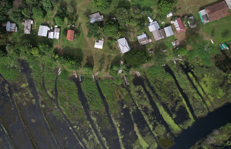 A drone view shows the Santa Izabel village on the Uaca indigenous land, near the mouth of the Amazon in Oiapoque