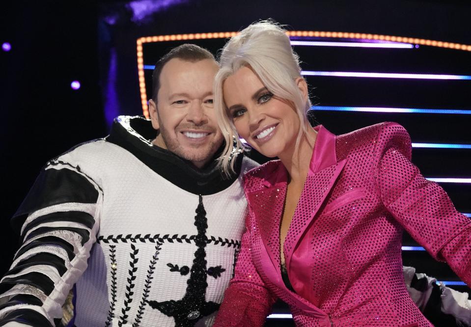 Donnie Wahlberg, left, and wife Jenny McCarthy in Wednesday's episode of "The Masked Singer."