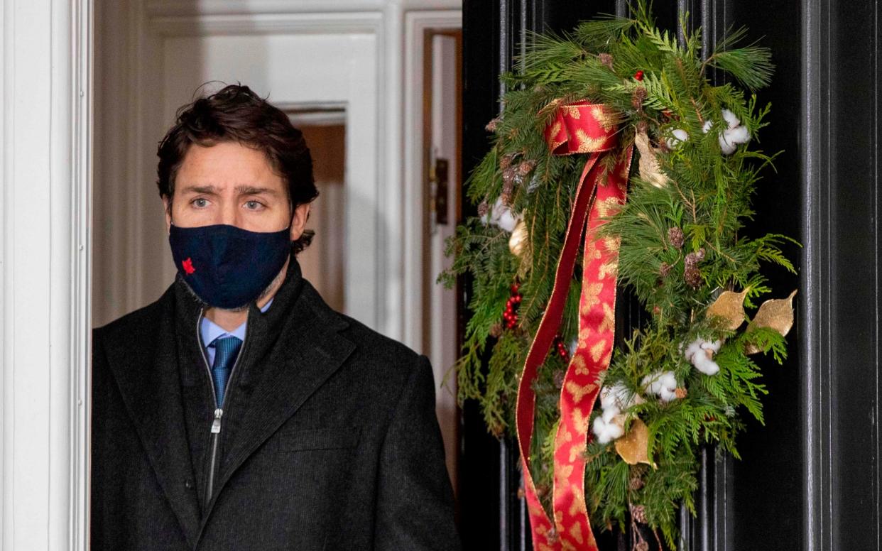 Canadian Prime Minister Justin Trudeau arrives for a Covid-19 pandemic briefing from Rideau Cottage in Ottawa  - AFP