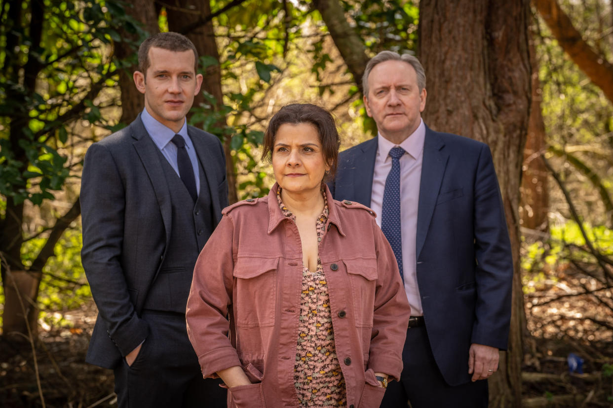 Bentley Productions for ITV and ITVX

Midsomer Murders SR23, Ep1: ITV, ITVX.

The Blacktrees Prophesy 

Pictured: NICK HENDRIX as DS Jamie Winter, NINA WADIA as Medora Salt and NEIL DUDGEON as DCI John Barnaby.

This photograph is (C) Bentley Productions and can only be reproduced for editorial purposes directly in connection with the programme or event mentioned above, or ITV plc. This photograph must not be manipulated [excluding basic cropping] in a manner which alters the visual appearance of the person photographed deemed detrimental or inappropriate by ITV plc Picture Desk.  This photograph must not be syndicated to any other company, publication or website, or permanently archived, without the express written permission of ITV Picture Desk. Full Terms and conditions are available on the website www.itv.com/presscentre/itvpictures/terms

For further information please contact:
Patrick.smith@itv.comÂ 07909906963                         