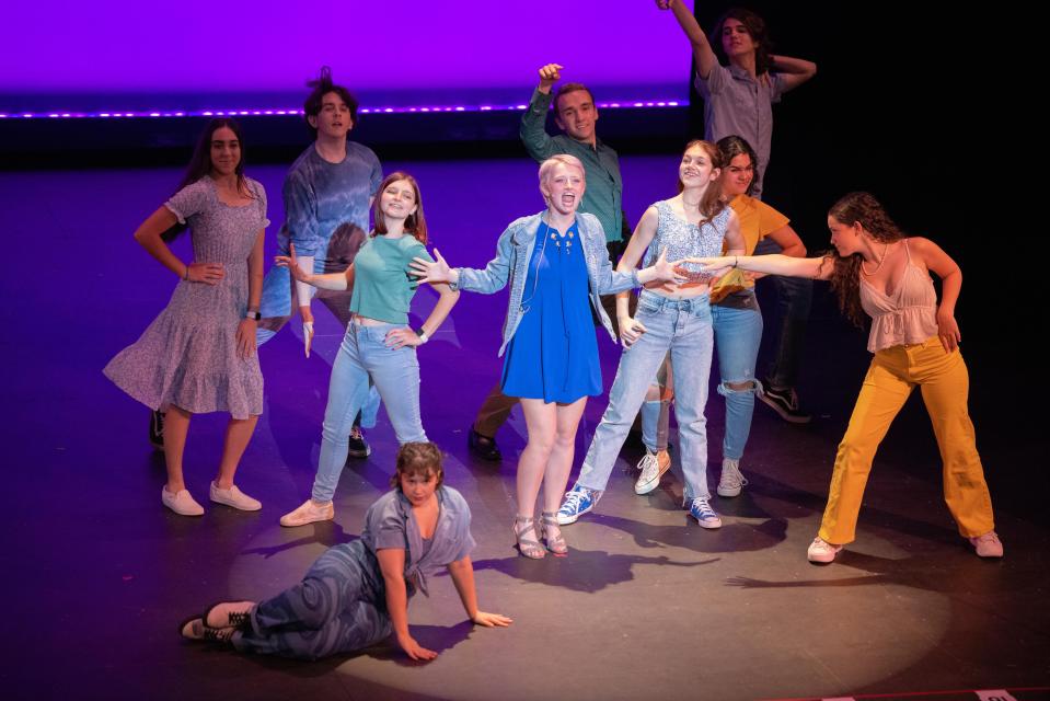 Gabi Ilg of Medina High School, center, performs in the opening number of the Playhouse Square Dazzle Awards on May 21. She won best actress in the regional competition.