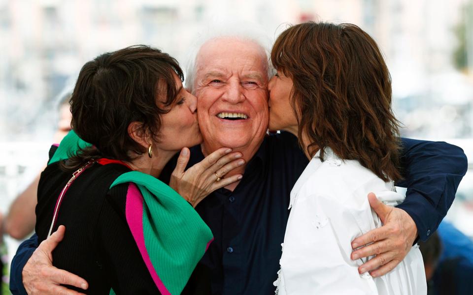 Cast members of Tout s'est bien passe (Everything Went Fine) Sophie Marceau and Geraldine Pailhas kiss Andre Dussollier - Johanna Geron/Reuters