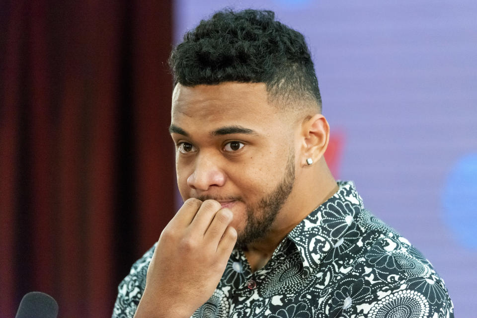 Alabama quarterback Tua Tagovailoa takes questions after announcing his intentions to declare for the 2020 NFL football draft, Monday, Jan. 6, 2020, in Tuscaloosa, Ala. (AP Photo/Vasha Hunt)