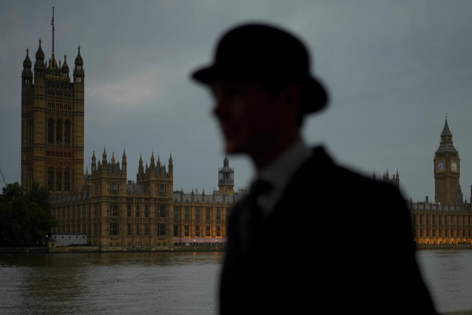 Alex Gerald from London arrives with the queue opposite of Westminster Palace to pay his respect to late Queen Elizabeth II (AP)