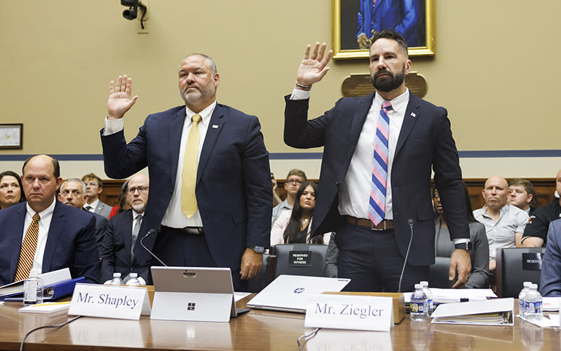 Gary Shapley, IRS Supervisory Special Agent, and whistleblower Joe Ziegler each raise their right hand as they are sworn in.