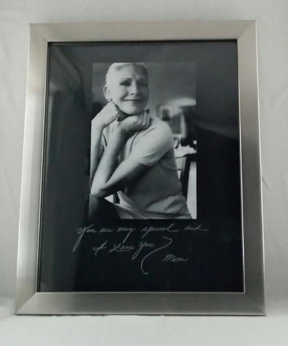 A Personalized Frame With Her Photo And Handwriting