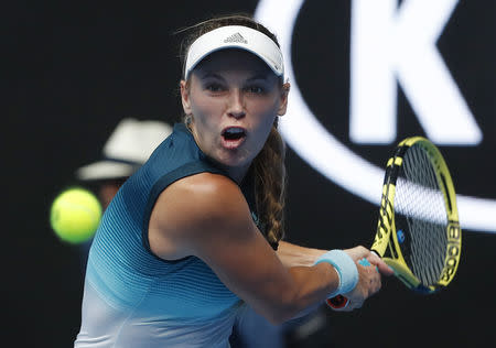 Tennis - Australian Open - Second Round - Melbourne Park, Melbourne, Australia, January 16, 2019. Denmark's Caroline Wozniacki in action during the match against Sweden's Johanna Larsson. REUTERS/Adnan Abidi