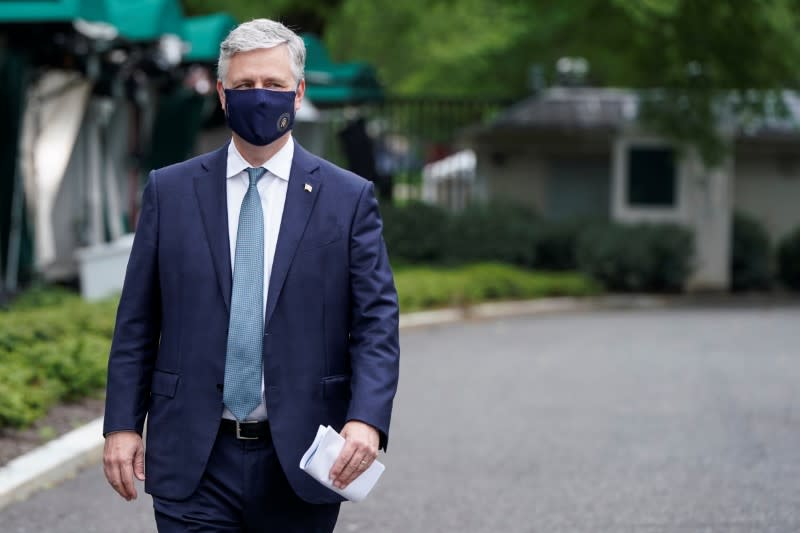 FILE PHOTO: National Security Advisor Robert O'Brien walks after being interviewed at the White House in Washington