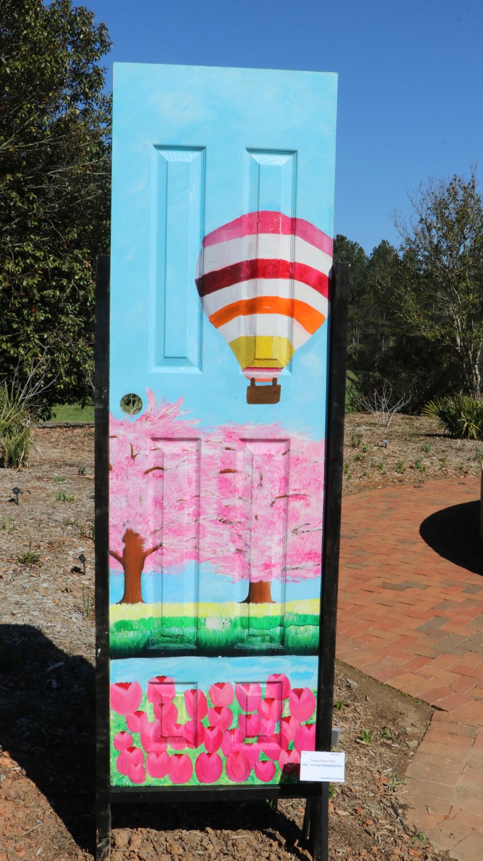 Highland School of Technology students painted doors for a display at Daniel Stowe Botanical Garden.
