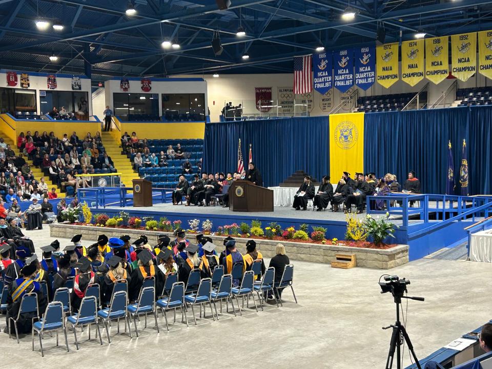 Whitney Gravelle, chairperson for the Bay Mills Indian Community, speaking to graduating students of LSSU during the 2023 commencement ceremony at Taffy Abel Arena on May 6, 2023.