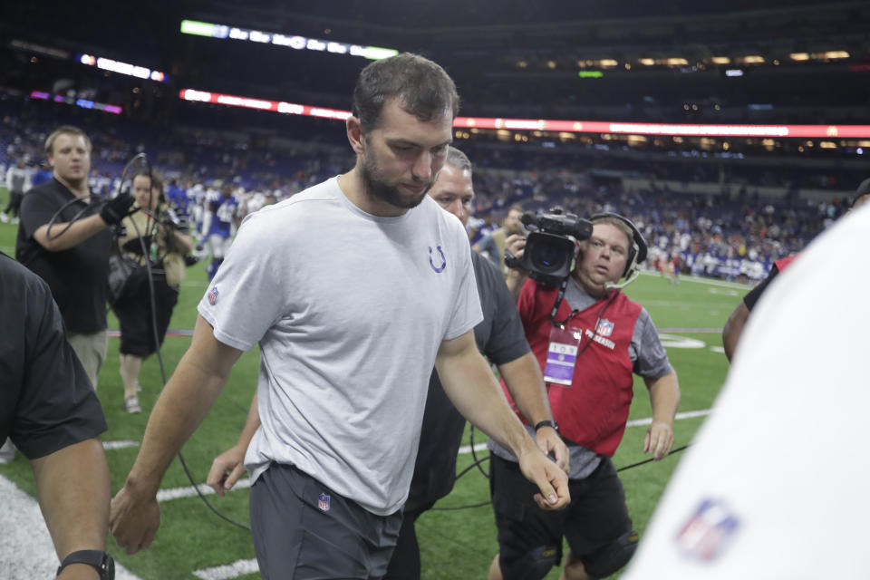 Indianapolis Colts quarterback Andrew Luck leaves the field following the team's preseason game, during which news of his retirement broke. (AP)