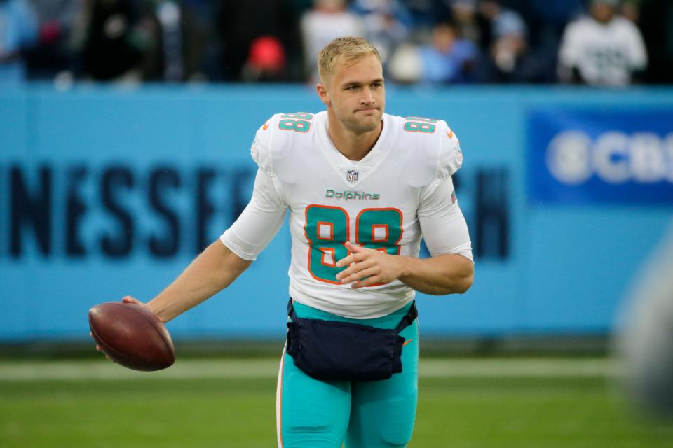 Miami Dolphins tight end Mike Gesicki (88) warms up before an NFL football game against the Tennessee Titans Sunday, Jan. 2, 2022, in Nashville, Tenn. (AP Photo/James Kenney)