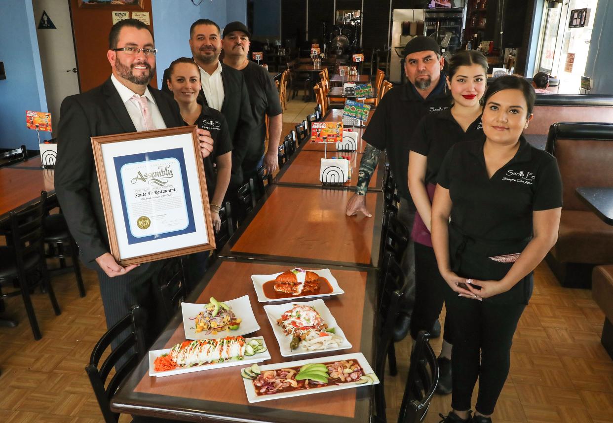 The Sante Fe Restaurant in Coachella was recognized as the 56th California State Assembly District's Small Business of the Year for helping its community during the pandemic. From left is owner Pedro Padilla, Iris Selvos, Omar Arguelles, Felix Caudillo, Carlos Obeso, Michelle Vargas and Paola Renteria.