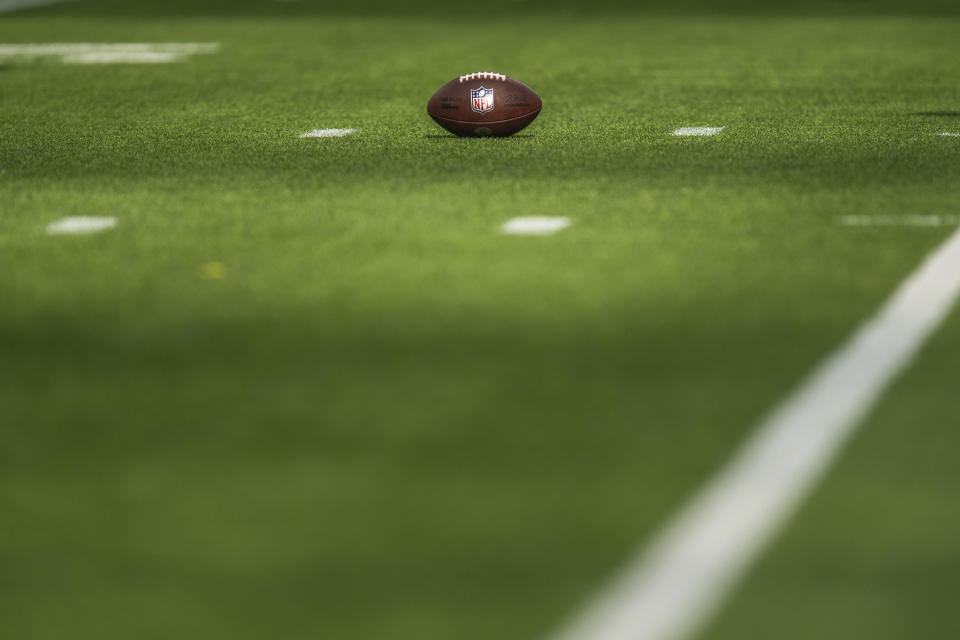 A National Football League ball sits on the field during an NFL football game between the Los Angeles Rams and the Philadelphia Eagles, Sunday, Oct. 8, 2023, in Inglewood, Calif. (AP Photo/Kyusung Gong)