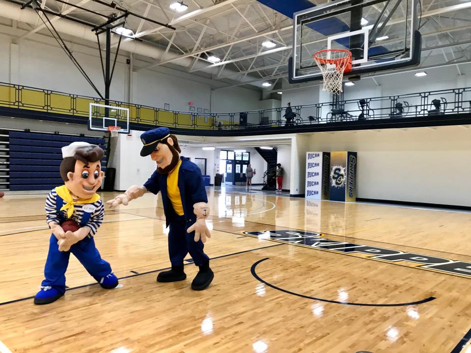 St. Clair County Community College's mascots Lil' Skip and Skip play basketball in SC4 Fieldhouse in Port Huron on Nov. 8, 2021.