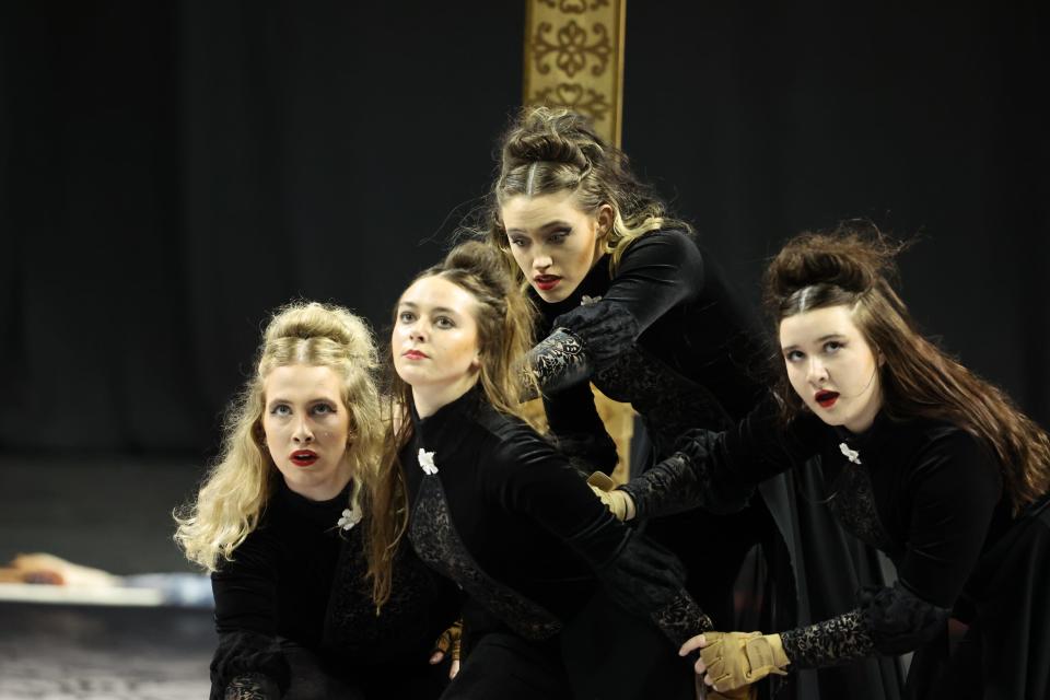 Members of the Arlington High School winter guard are photographed during their production of "Lizzie" at the WGI Sport of the Arts world championships on April 12, 2024.