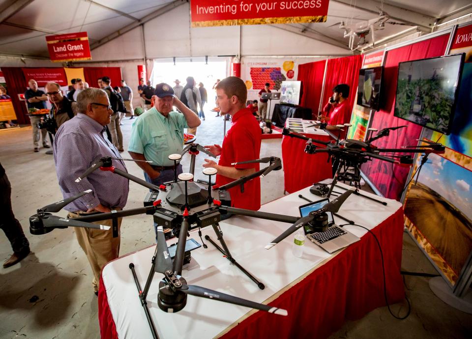 U.S. Secretary of AgricultureÂ Sonny Perdue, center,  and Under Secretary for Farm Production and Conservation Bill Northey tour drone display at the ISU pavilion at the Farm Progress Show Wednesday, Aug. 29, 2018, near Boone, Iowa.