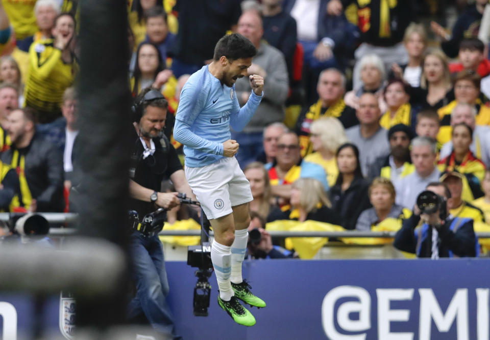 Manchester City's David Silva celebrates after scoring his side's first goal during the English FA Cup Final soccer match between Manchester City and Watford at Wembley stadium in London, Saturday, May 18, 2019. (AP Photo/Kirsty Wigglesworth)